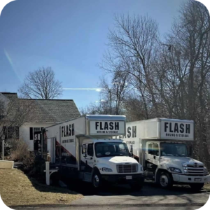 moving trucks parked near house Flash Moving & STorage